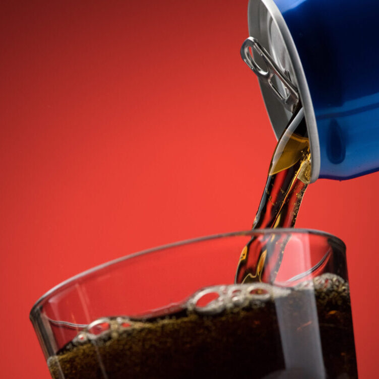 https://berrycoffee.com/wp-content/uploads/2020/03/pouring-a-soft-drink-in-a-glass-PLHVD6N-scaled-e1587998308290.jpg